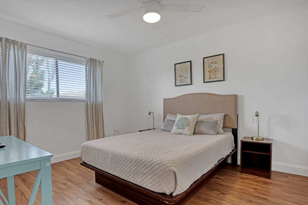 Second bedroom with queen bed and nautical decor